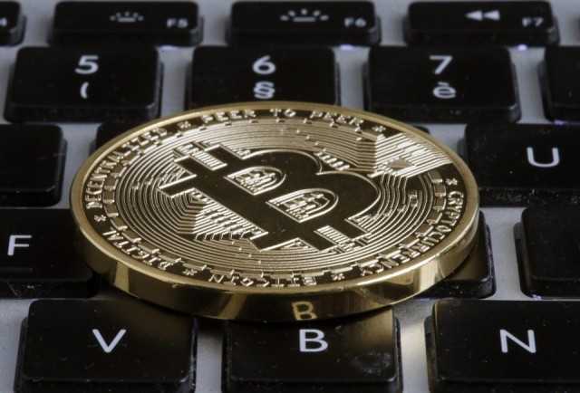 A bitcoin árfolyama 14 ezer dollár fölé emelkedett